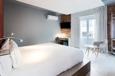 Cama o camas de una habitación en B&B HOTEL Madrid Centro Fuencarral 52