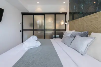Cama o camas de una habitación en Deluxe SOL, by MONARO