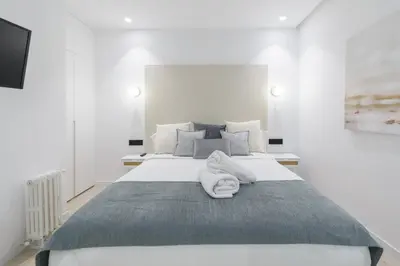 Cama o camas de una habitación en Deluxe SOL, by MONARO