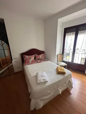 Cama o camas de una habitación en Habitación privada con balcones, centro Madrid, Malasaña