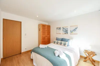 Cama o camas de una habitación en ARCO Gran Via Boutique Apartments