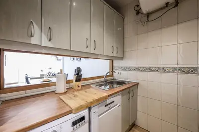Una cocina o zona de cocina en GranVia Garden Boutique Apartments