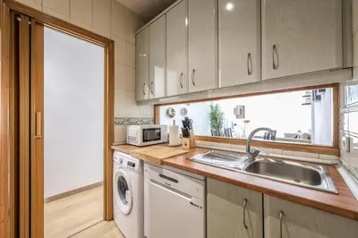 Una cocina o zona de cocina en GranVia Garden Boutique Apartments