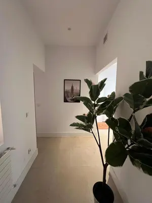 Una televisión o centro de entretenimiento en Private rooms in Magdalena Street