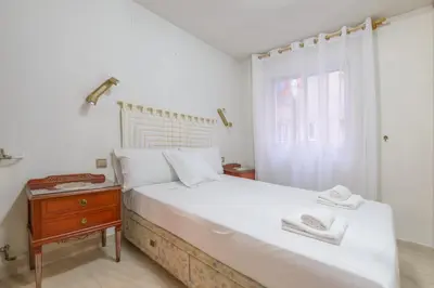 Cama o camas de una habitación en GuestReady - Confy flat in Madrid