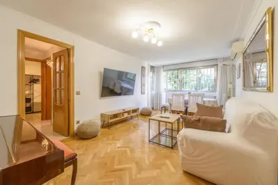 Una televisión o centro de entretenimiento en GuestReady - Confy flat in Madrid