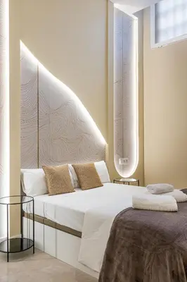 Cama o camas de una habitación en Queen's Chamberí Boutique I - Alojamiento Corta Estancia