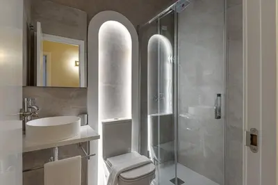 Un baño de Queen's Chamberí Boutique I - Alojamiento Corta Estancia