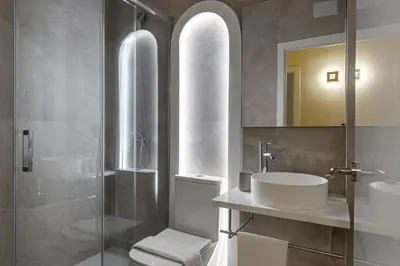 Un baño de Queen's Chamberí Boutique I - Alojamiento Corta Estancia