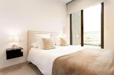Cama o camas de una habitación en NewMad en Madrid