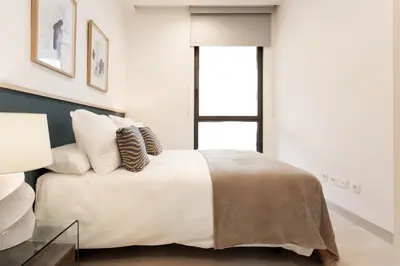 Cama o camas de una habitación en NewMad en Madrid