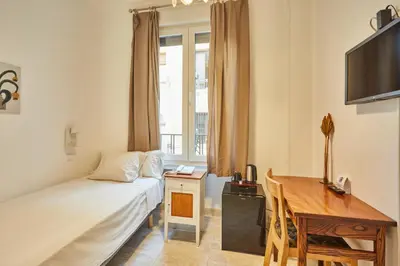 Una televisión o centro de entretenimiento en Hostal Barrera