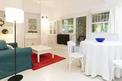 Zona de estar de Nice house with courtyard in Puerta del Angel - Mauregato
