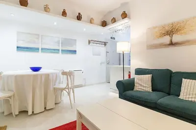 Zona de estar de Nice house with courtyard in Puerta del Angel - Mauregato