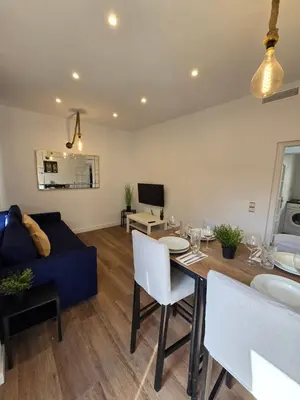 Una televisión o centro de entretenimiento en Apartamento Laguna