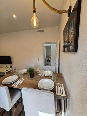 Una televisión o centro de entretenimiento en Apartamento Laguna
