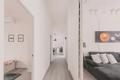 Cama o camas de una habitación en Amplio Piso de 7 habs, 4 baños sobre calle Gran Vía