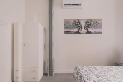 Cama o camas de una habitación en Amplio Piso de 7 habs, 4 baños sobre calle Gran Vía
