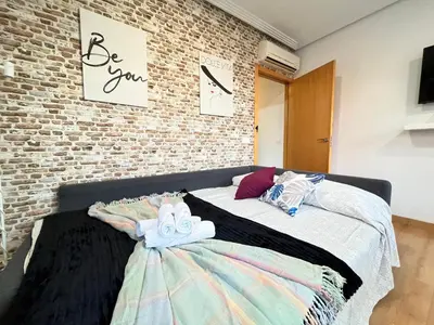 Cama o camas de una habitación en Madrid 2 Javalambre Temporal