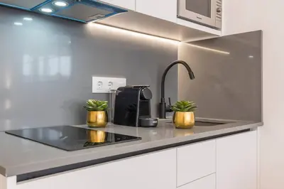 Una cocina o zona de cocina en NEW APT in the heart of Madrid