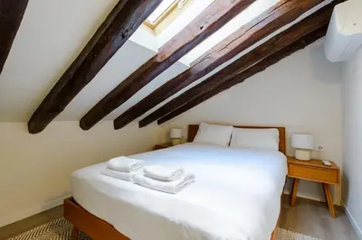 Cama o camas de una habitación en GuestReady - Industrial gem near Plaza de España