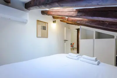 Cama o camas de una habitación en GuestReady - Industrial gem near Plaza de España
