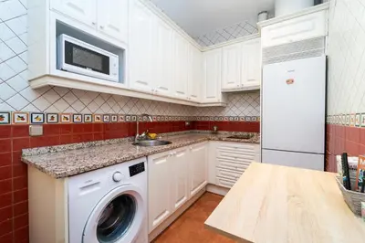 Una cocina o zona de cocina en GuestReady - Comodo estudio muy cerca de Gran Vía