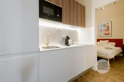 Cama o camas de una habitación en Confort y cultura para 10, en el vibrante Lavapiés