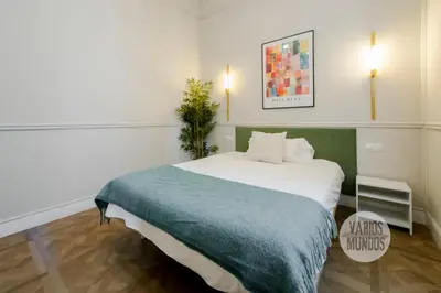 Cama o camas de una habitación en Confort y cultura para 10, en el vibrante Lavapiés