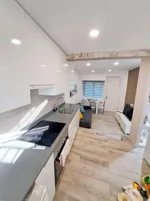 Una cocina o zona de cocina en Modern Apartment in Madrid