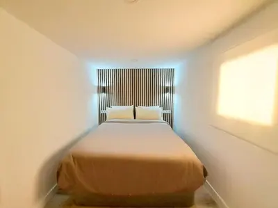 Cama o camas de una habitación en Modern Apartment in Madrid