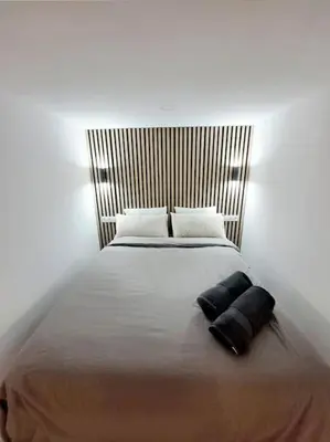 Cama o camas de una habitación en Modern Apartment in Madrid