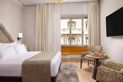 Cama o camas de una habitación en NH Collection Madrid Paseo del Prado