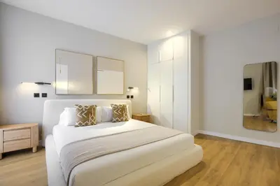 Cama o camas de una habitación en Dobo Madrid Justicia