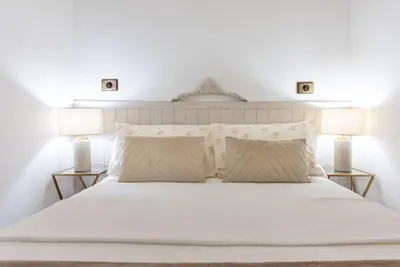 Cama o camas de una habitación en Un lujo en plena Calle Goya