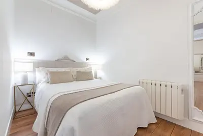 Cama o camas de una habitación en Un lujo en plena Calle Goya