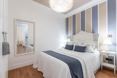 Cama o camas de una habitación en Un lujo en plena Calle Goya