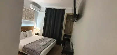 Cama o camas de una habitación en CH Otello Rooms I - Madrid