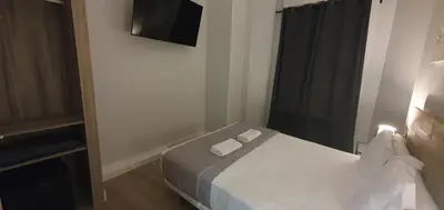 Cama o camas de una habitación en CH Otello Rooms I - Madrid