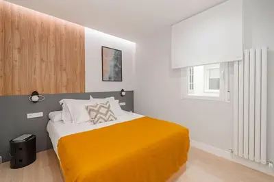 Cama o camas de una habitación en Salamanca VIII Calle Alcántara 2BR 2BH