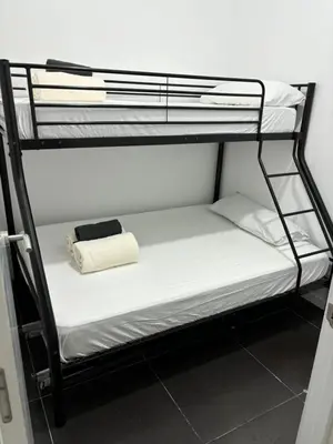 Cama o camas de una habitación en local adaptado Madrid