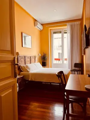 Cama o camas de una habitación en La casa de la escritora