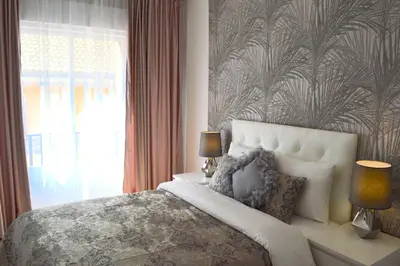 Cama o camas de una habitación en Palacio Apartments Madrid Temporal