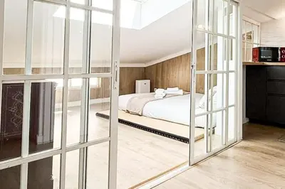 Cama o camas de una habitación en Charming penthouse in Madrid-Centro - Oso