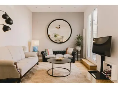 Una televisión o centro de entretenimiento en Spectacular penthouse in Barrio de Salamanca - Jorge Juan