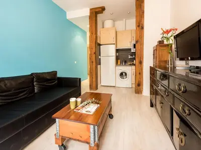 Una cocina o zona de cocina en YOUR COZY NEST PLAZA MAYOR - SOL - RASTRO - WIFI - Almendro