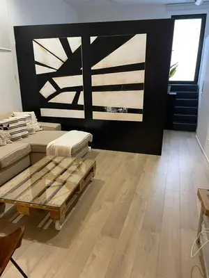 Zona de estar de Exyca Barrio Salamanca