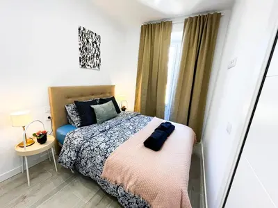 Cama o camas de una habitación en Madrid Private Rooms - Ferrer