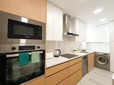 Una cocina o zona de cocina en Madrid Private Rooms - Ferrer