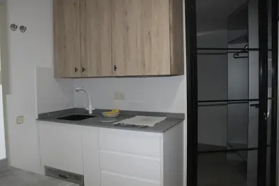Una cocina o zona de cocina en Madrid villa suites Rústico